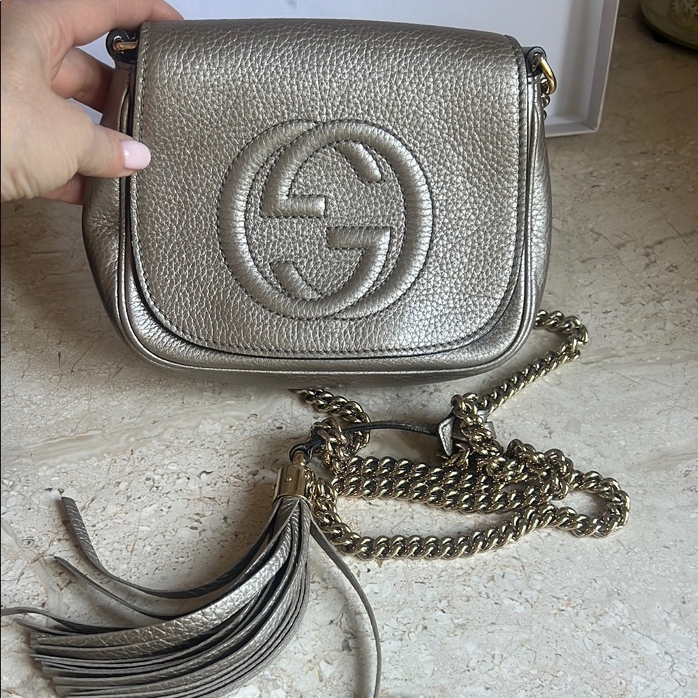 Gucci Silver Crossbody Bag with Iconic GG Logo and Tassel Detail